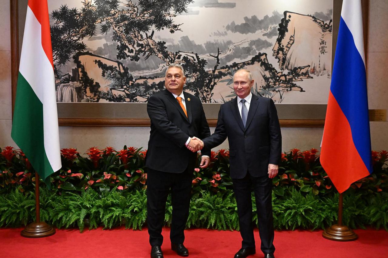 Russian President Putin and Hungarian Prime Minister Orban meet in Beijing