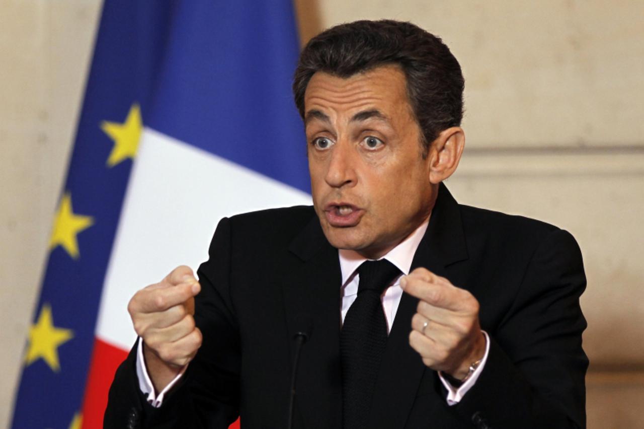 \'France\'s President Nicolas Sarkozy gives his New Year address to labour union representatives and social partners during his traditional speech at the Elysee Palace in Paris January 6, 2011.  REUTE