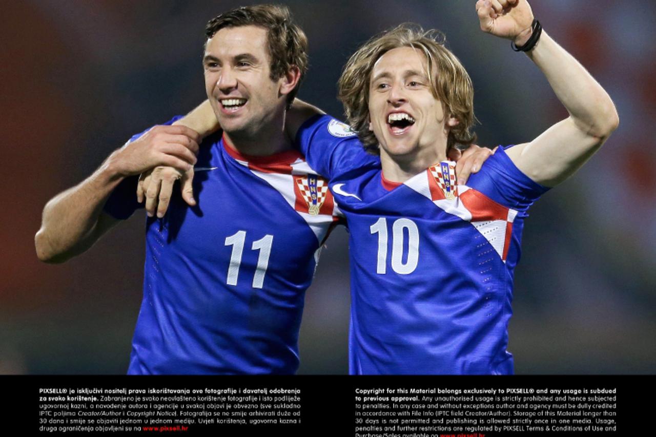 '22.03.2013., stadion u Maksimiru, Zagreb - Kvalifikacijska nogometna utakmica za Svjetsko prvenstvo 2014. u Brazilu, skupina A, Hrvatska - Srbija. Darijo Srna i Luka Modric slave nakon rezultata 2:0.