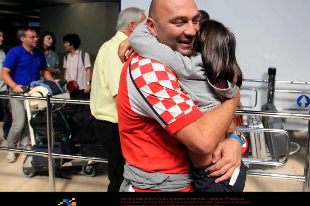 '01.08.2011., Zagreb - Hrvatska vaterpolska reprezentacija na zagrebackom aerodoromu Pleso na povratku sa SP-a u Sangaju na kojem su osvojili trece mjesto. Vaterpoliste nije nitko docekao i  nije bilo