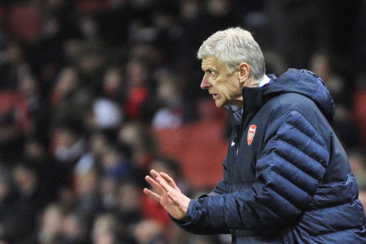 'Arsenal's manager Arsene Wenger gestures during their Champions League Group B soccer match against Montpellier at the Emirates Stadium in London November 21, 2012. REUTERS/Toby Melville (BRITAIN - 