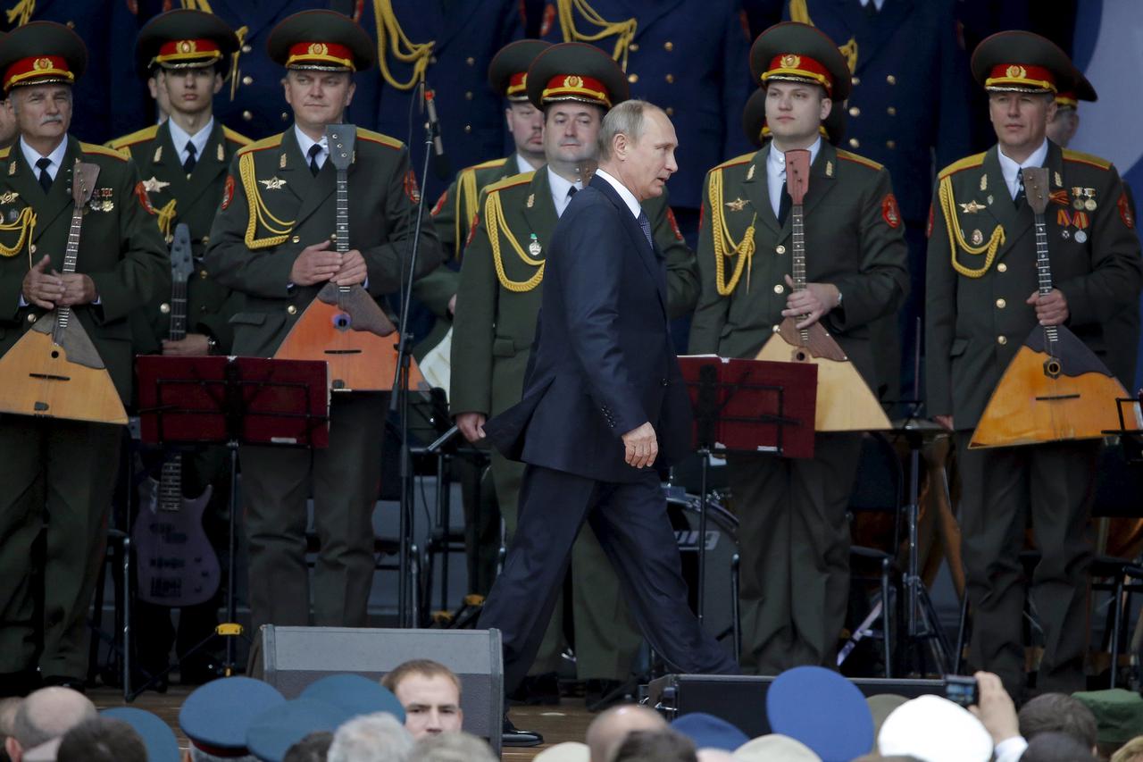 Russian President Vladimir Putin arrives for the opening of the Army-2015 international military forum in Kubinka, outside Moscow, Russia, June 16, 2015. Putin said on Tuesday Russia would add more than 40 new intercontinental ballistic missiles to its nu