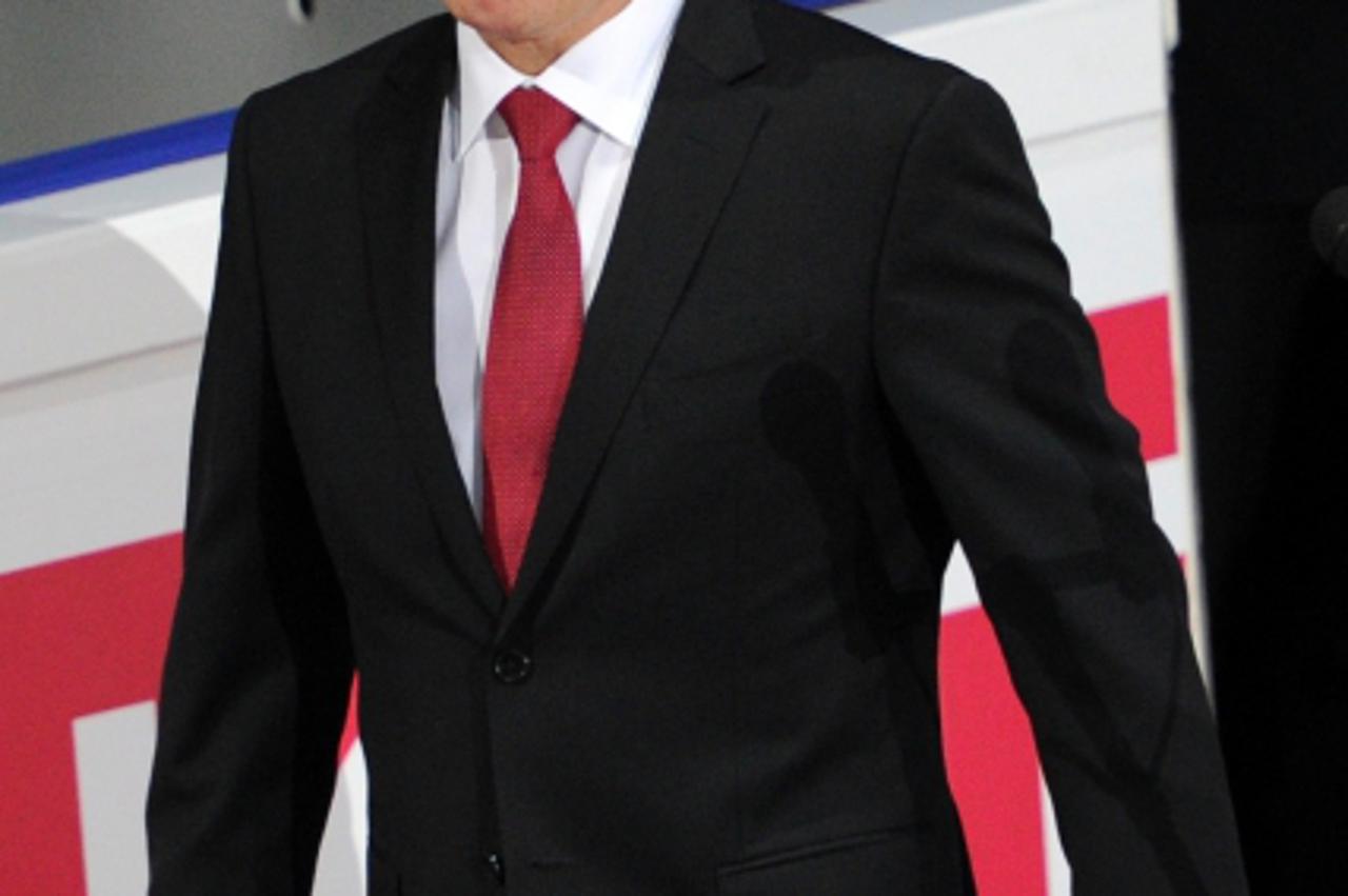 \'Russian Prime Minister Vladimir Putin arrives to give a speech during the men\'s short program event of the ISU World Figure Skating Championships on April 27, 2011 in Moscow.          AFP PHOTO / A