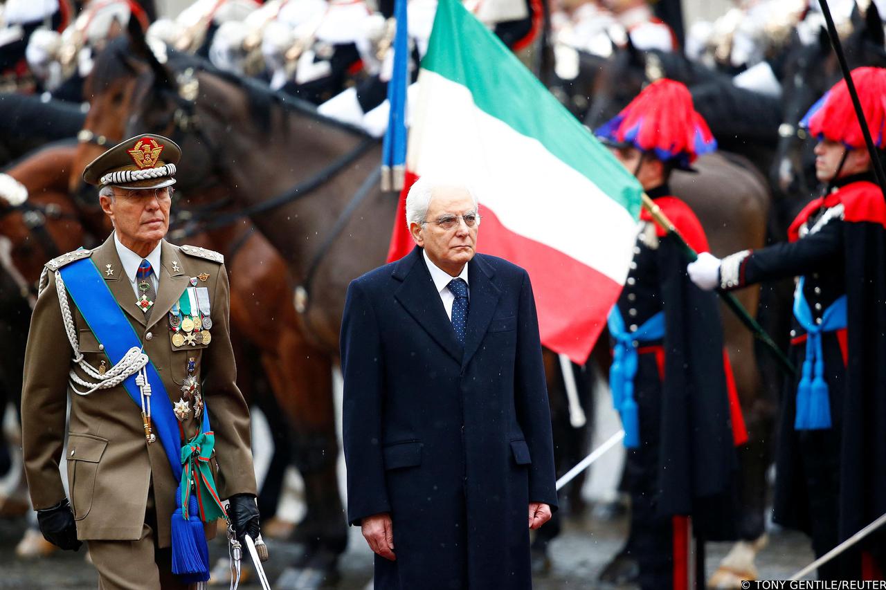 FILE PHOTO: Italy's new President Sergio Mattarella inspects a guard of honour during a welcoming ceremony at the Quirinale presidential palace in Rome