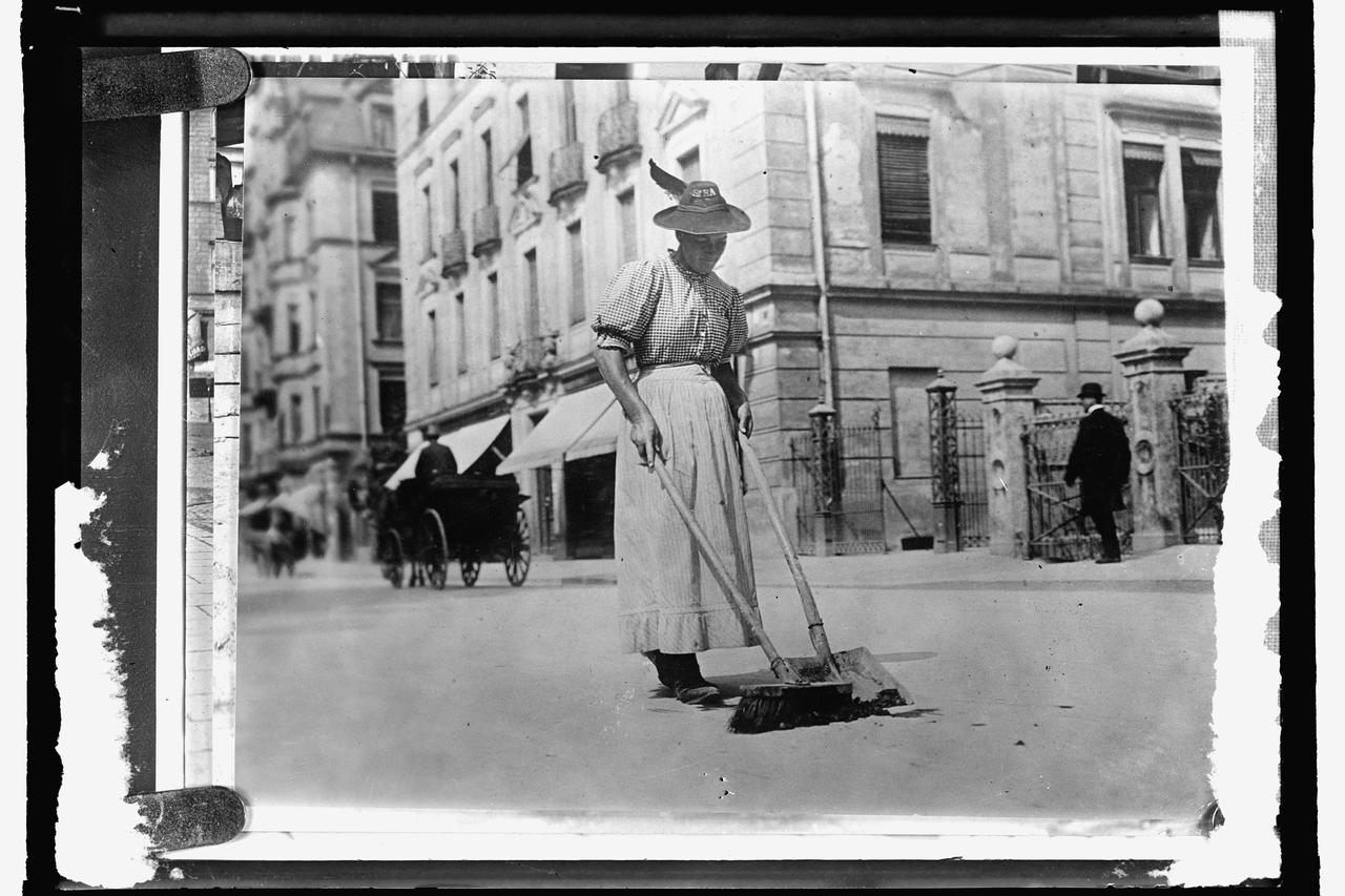 A woman street worker sweeps a street in Germany, circa 1909-1920, in this Library of Congress handout photo. For women 100 years ago, opportunities to work beyond the home and take part in political life were very limited. As the 20th century progressed,