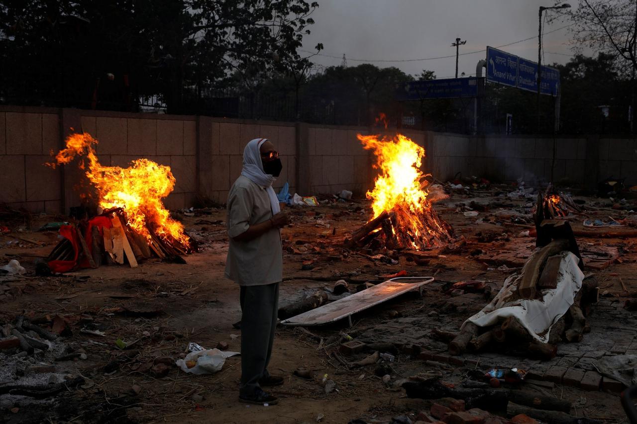 Mass cremation of coronavirus disease (COVID-19) victims at a crematorium in New Delhi