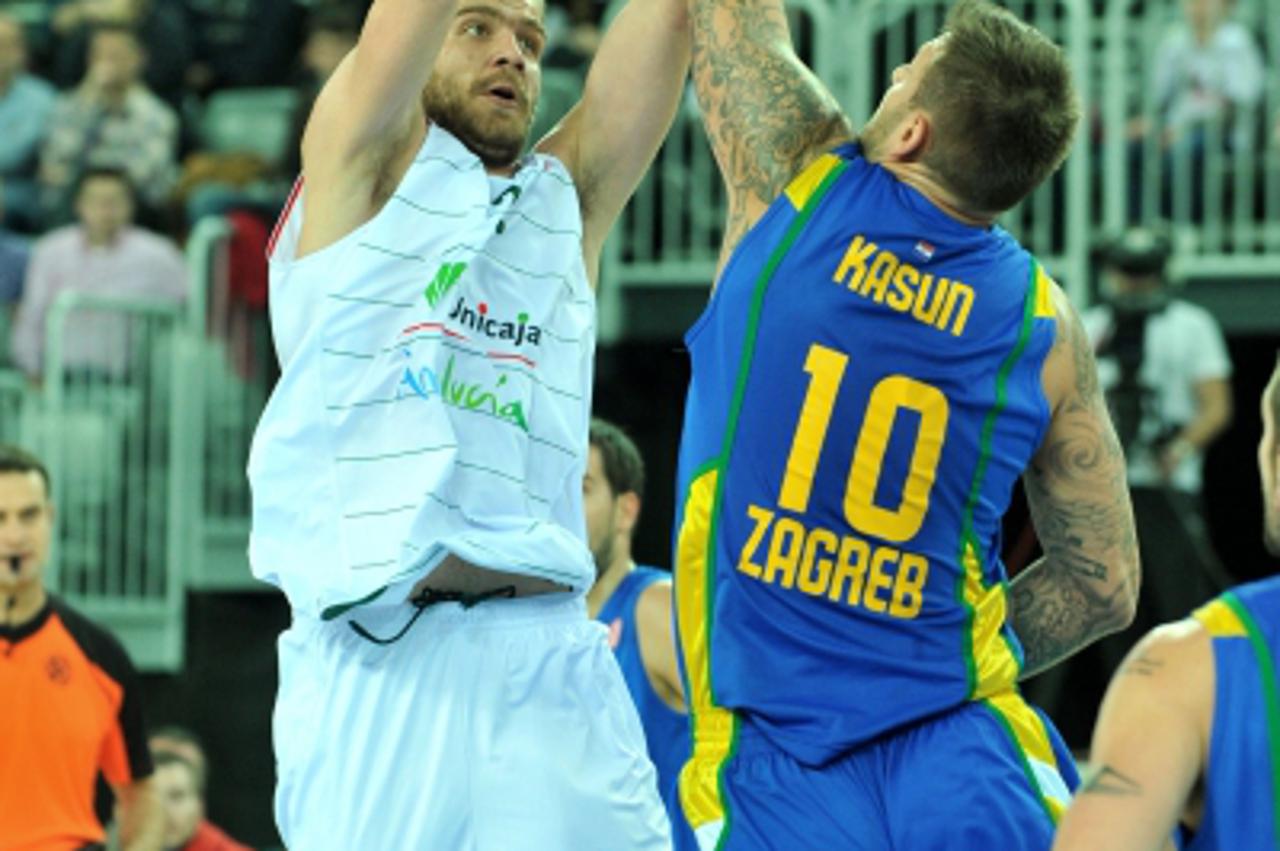 '14.12.2011., Zagreb - Arena zagreb, kosarkaska utakmica Euroleague izmedju KK Zagreb Croatioa osiguranje i Unicaja Malaga. Luka Zoric, Mario Kasun Photo: Marko Lukunic/PIXSELL'