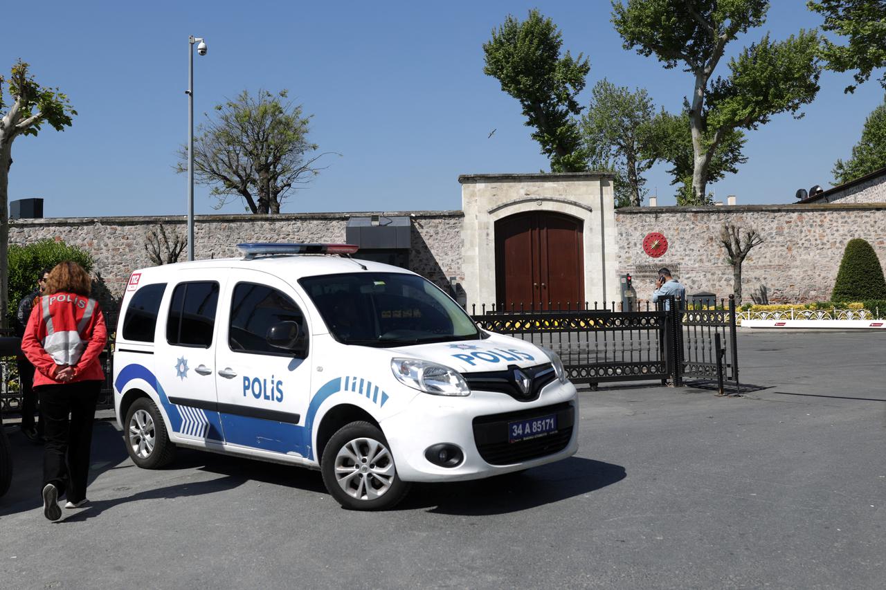 A police car is parked outside the Turkish Presidency's Dolmabahce working office in Istanbul