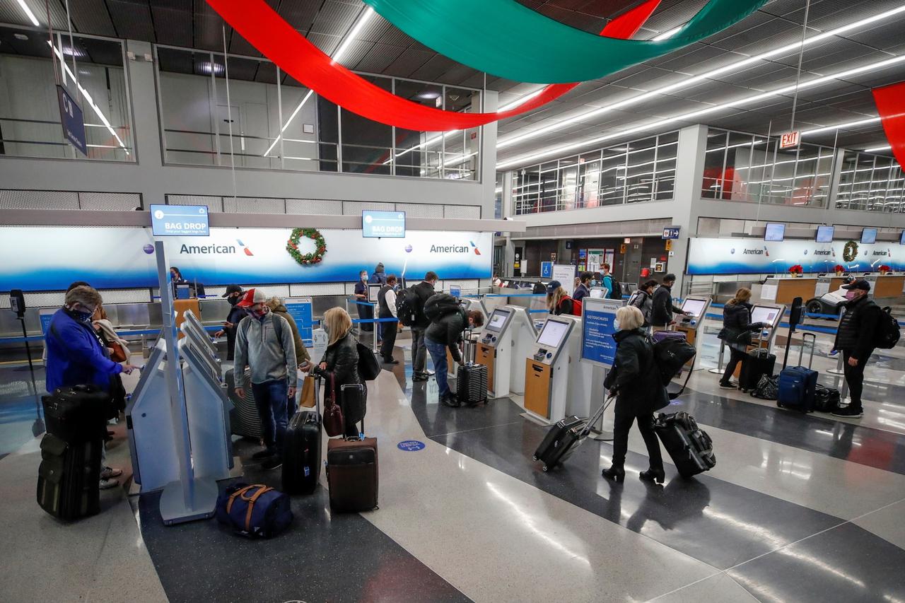 Travelers at O'Hare International Airport ahead of the Thanksgiving holiday in Chicago