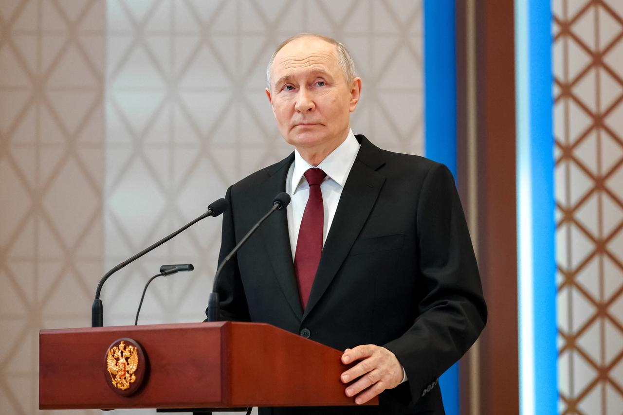 Russian President Vladimir Putin holds a press conference in Astana