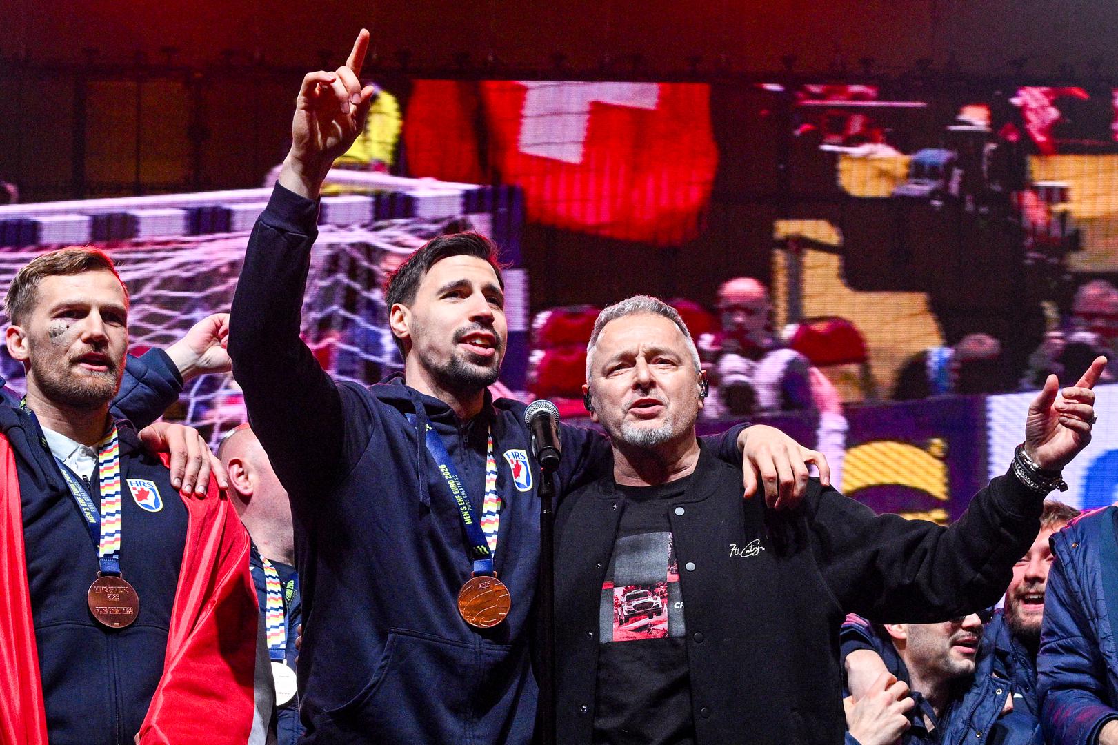 02.02.2026., Zagreb - Svecani docek hrvatske rukometne reprezentacije u na Trgu bana Josipa Jelacica nakon osvojene broncane medalje na Europskom rukometnom prvenstvu. David Mandic, Ivan Martinovic, Marko Perkovic Thompson i Zlatko Rauzan Photo: Davor Puklavec/PIXSELL