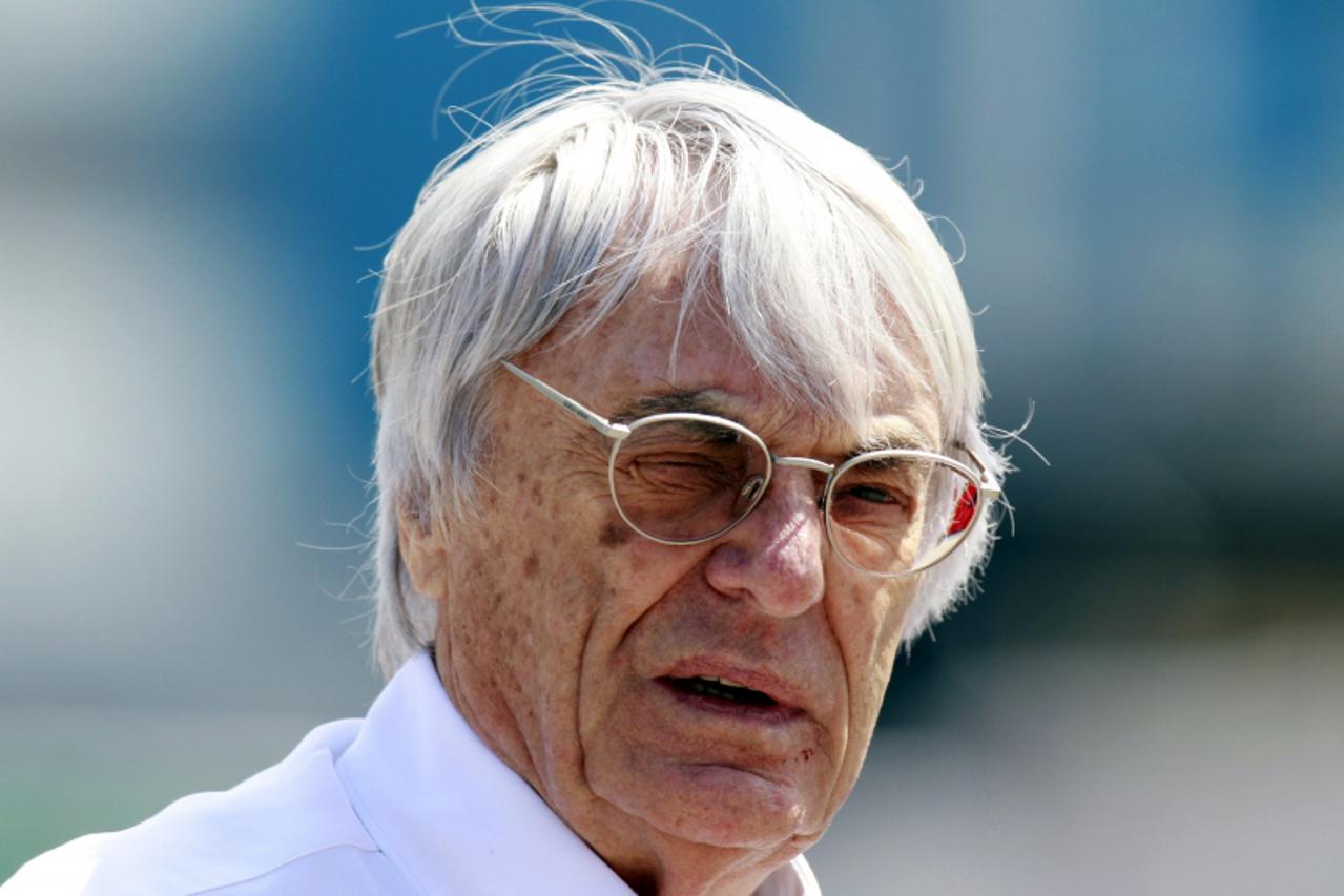 'Formula One commercial supremo Bernie Ecclestone walks in the paddock before the Turkish F1 Grand Prix at the Istanbul Park circuit in Istanbul, in this file picture taken May 8, 2011. Formula One\'s