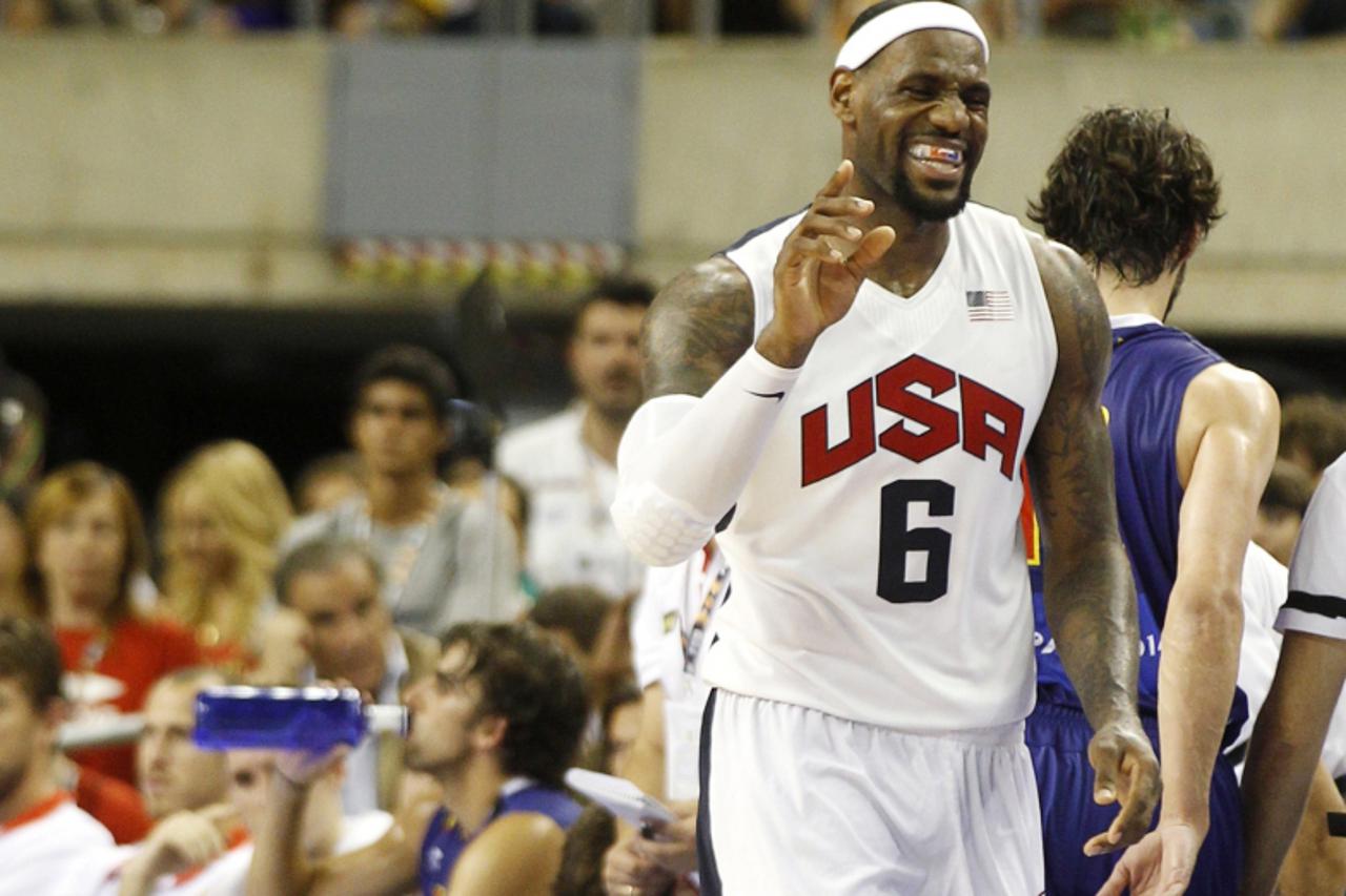 'U.S. Olympic basketball player LeBron James gestures during an exhibition game against Spain ahead of the 2012 London Olympic Games at Palau Sant Jordi in Barcelona July 24, 2012. REUTERS/Gustau Naca