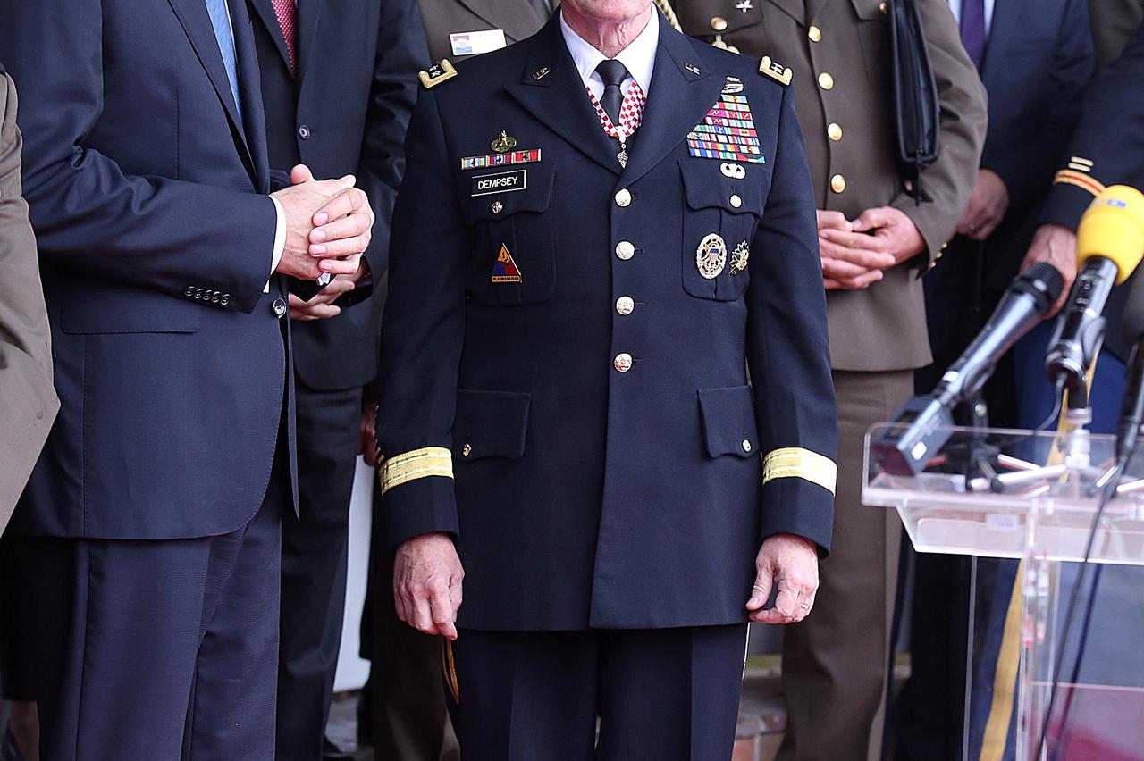 22.09.2014., Zagreb - General Martin E. Dempsey, predsjedavajuci zdruzenog stozera oruzanih snaga SAD-a, ministar obrane Ante Kotromanovic i nacelnik glavnog stozera OS RH general zbora Drago Lovric u vojarni Croatia u Zagrebu prisustvovali su primopredaj