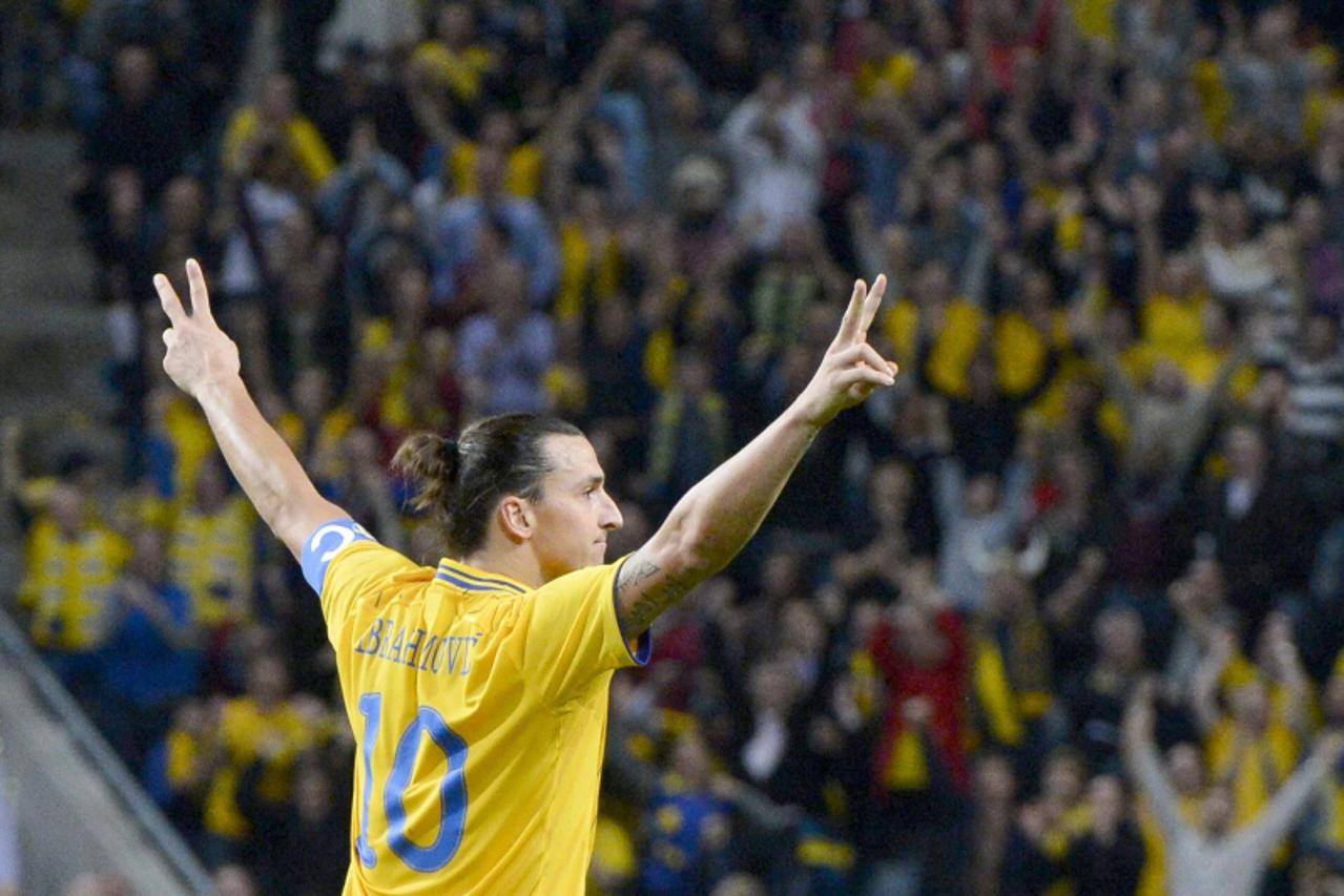 'Sweden's Zlatan Ibrahimovic celebrates his third goal during their international friendly soccer match against England at the Friends Arena in Stockholm November 14, 2012.   REUTERS/Claudio Brescian