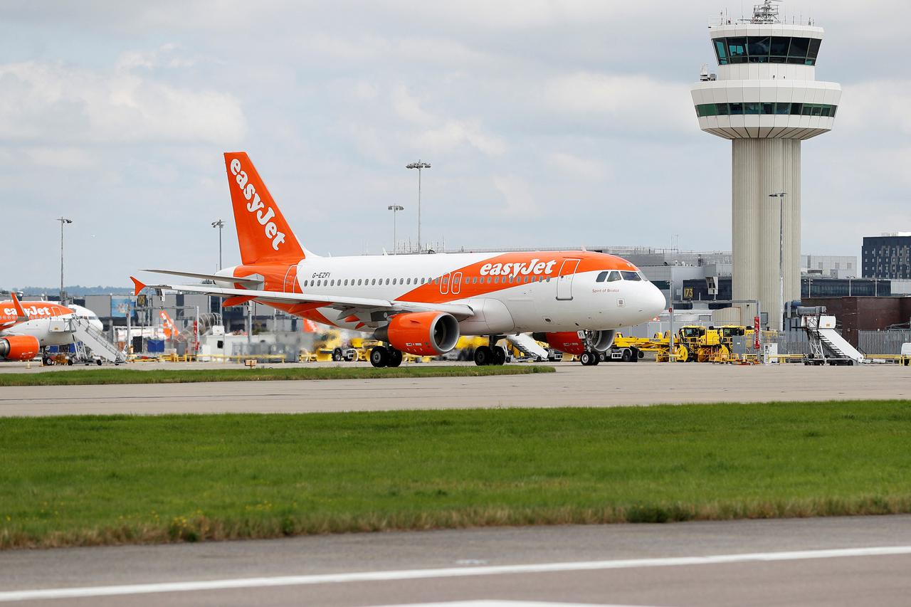 FILE PHOTO: An Easyjet Airbus aircraft taxis close to the northern runway at Gatwick Airport in Crawley