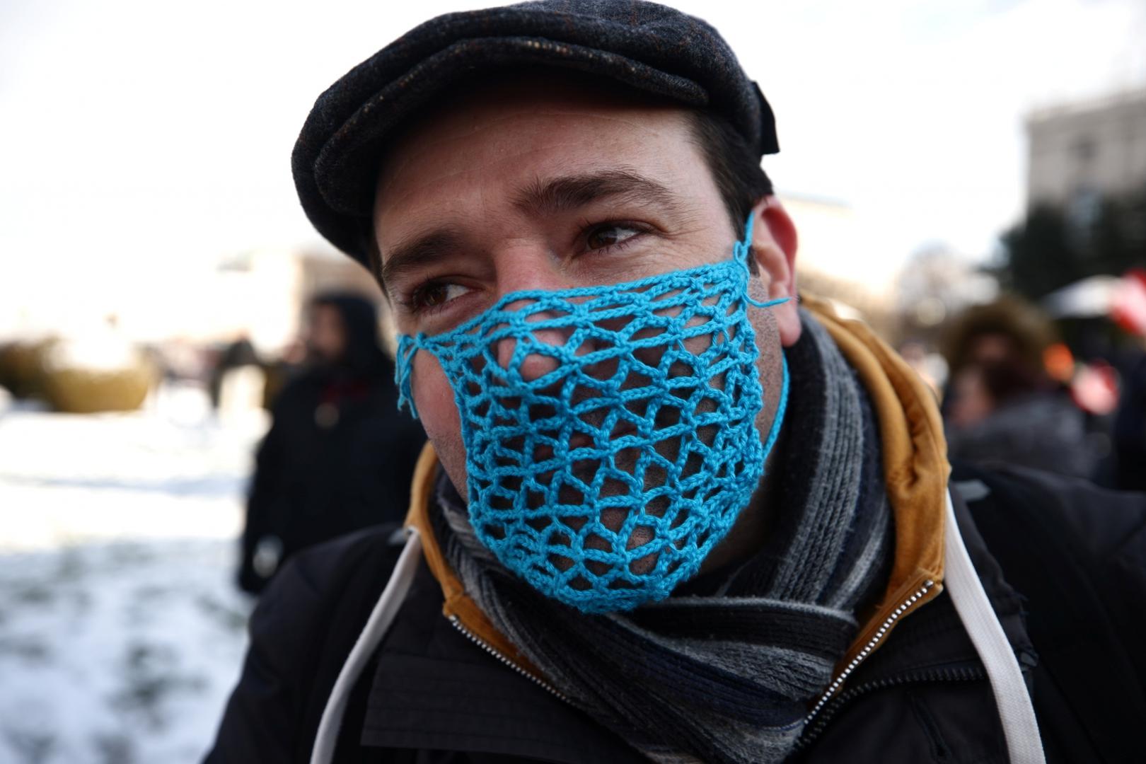 Demonstration against the COVID-19 measures and their economic consequences, in Vienna A protester attends a demonstration against the coronavirus disease (COVID-19) measures and their economic consequences in Vienna, Austria, January 16, 2021. REUTERS/Lisi Niesner LISI NIESNER