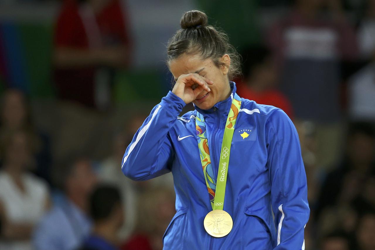 2016 Rio Olympics - Judo - Victory Ceremony - Women -52 kg Victory Ceremony - Carioca Arena 2 - Rio de Janeiro, Brazil - 07/08/2016. Majlinda Kelmendi (KOS) of Kosovo reacts. REUTERS/Toru Hanai FOR EDITORIAL USE ONLY. NOT FOR SALE FOR MARKETING OR ADVERTI