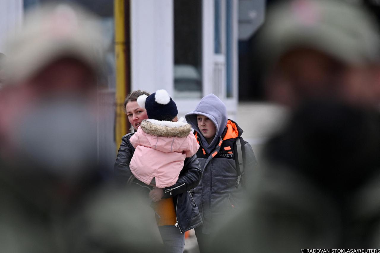 Ukrainians head for Slovak border crossing, in Vysne Nemecke