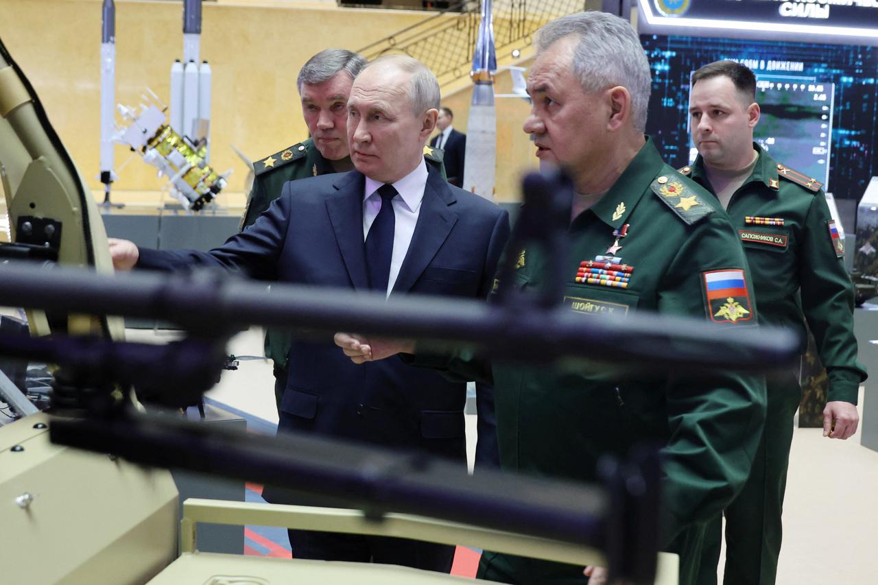Russian President Vladimir Putin attends an expanded meeting of the Defence Ministry Board in Moscow