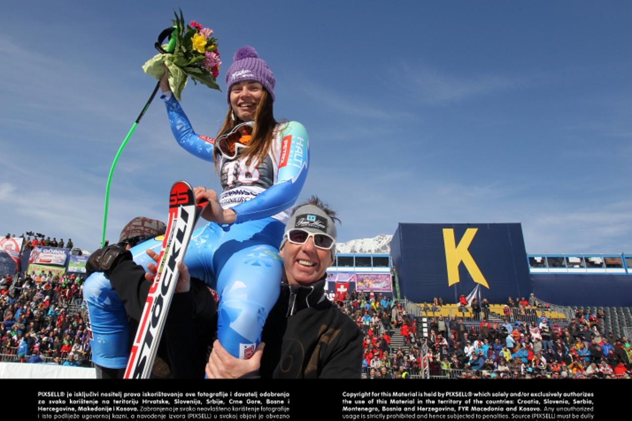 'Winner Tina Maze (Slovenia) cheers in the finish area after the women's downhill race of the Alpine Skiing World Cup in Garmisch-Partenkirchen, Germany, 02 March 2013. Photo: Stephan Jansen/DPA/PIXS