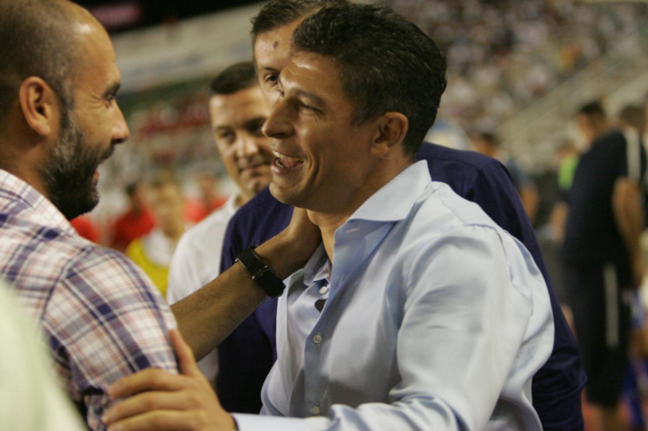 '23.07.2011., Stadion Poljud, Split - Prijateljska nogometna utakmica izmedju NK Hajduk i FC Barcelona odrzana povodom stotog rodjendana Hajduka. Guardiola i Balakov na kraju utakmice. Photo: Ivo Caga