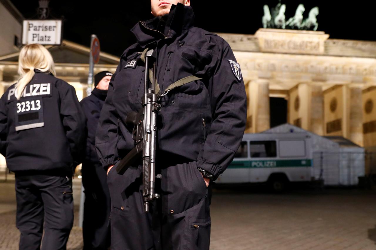 German police provide security at the Brandenburg Gate, ahead of the upcoming New Year's Eve celebrations in Berlin, Germany December 27, 2016.  REUTERS/Fabrizio Bensch     TPX IMAGES OF THE DAY