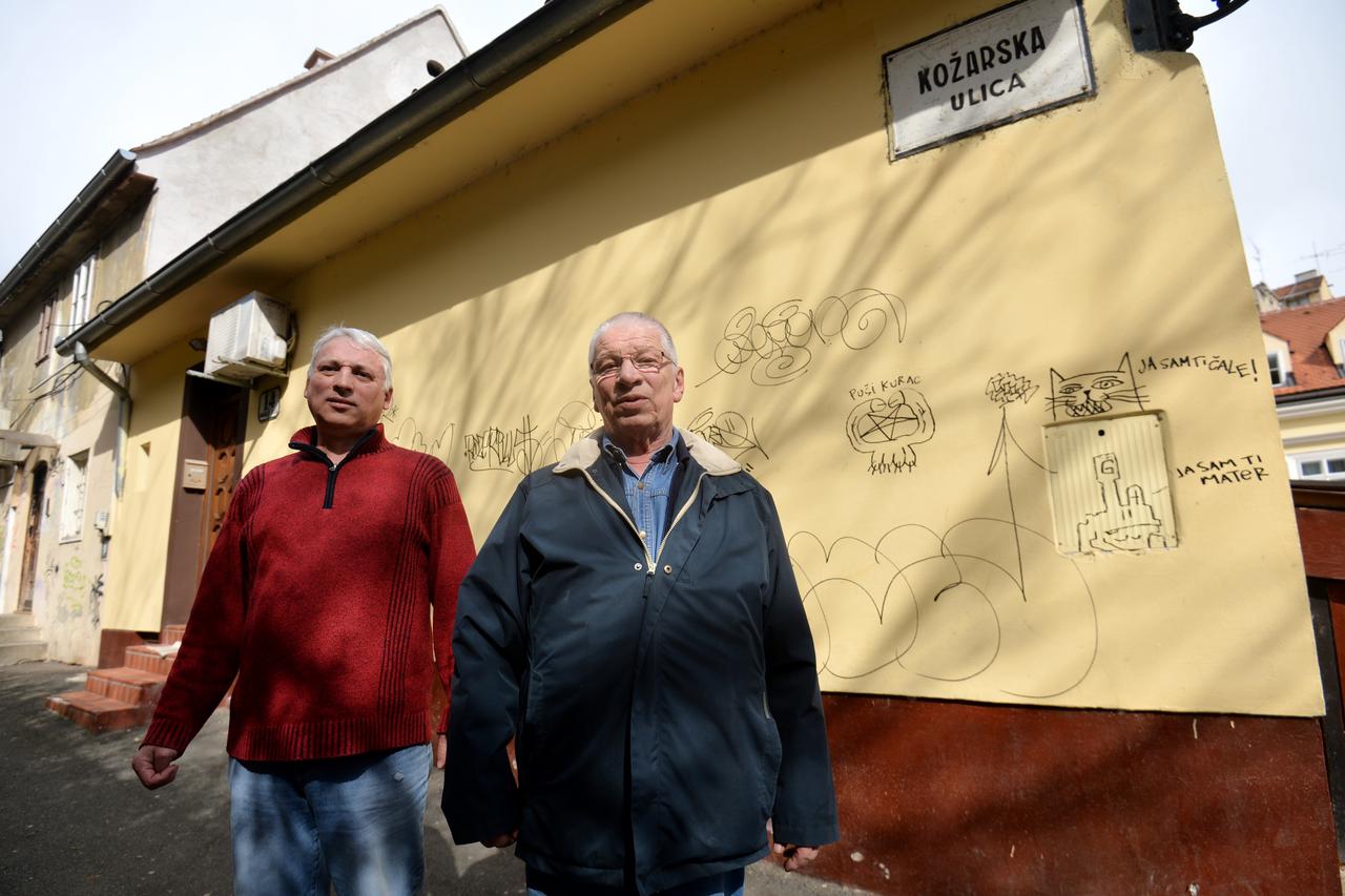 10.03.2017., Zagreb - Obitelj Hrzenjak koja zivi u Tkalcicevoj 41 po nekoliko puta godisnje mora bojati fasadu kuce jer je vandali uniste grafitima.  Photo: Marko Lukunic/PIXSELL