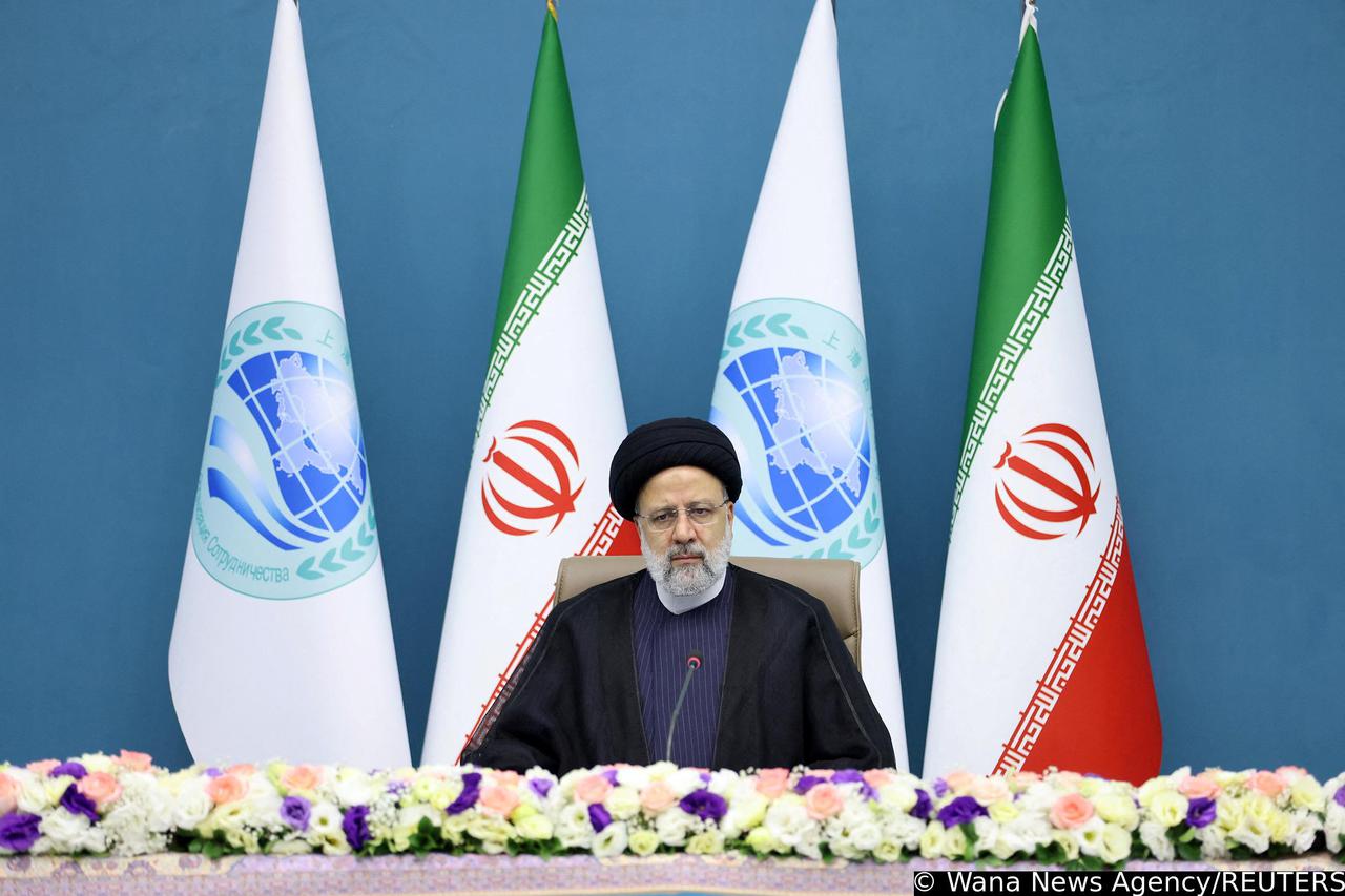 Iranian President Raisi attends the SCO meeting via video link at the Office of the President of Iran, in Tehran