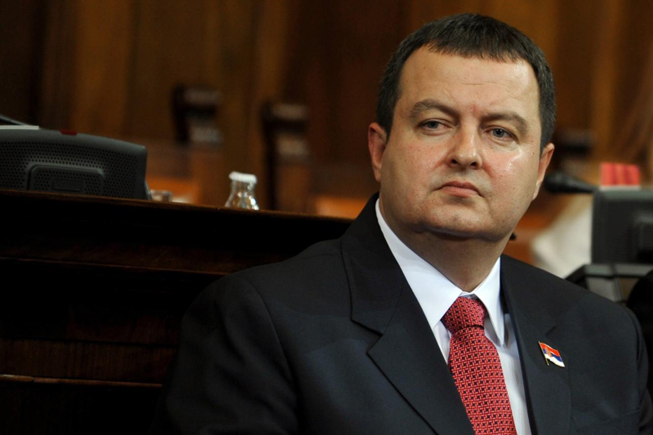 'Prime minister-designate Ivica Dacic looks on at the Serbian National assembly building during of a parliament session in Belgrade on July 26, 2012.   AFP PHOTO / ANDREJ ISAKOVIC'