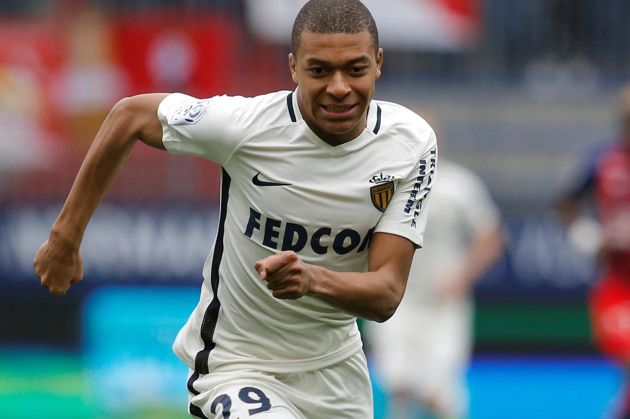 Football Soccer - SM Caen v AS Monaco - French Ligue 1 - Michel d'Ornano stadium, Caen, France - 19/03/2017. Monaco's Kylian Mbappe in action. REUTERS/Stephane Mahe