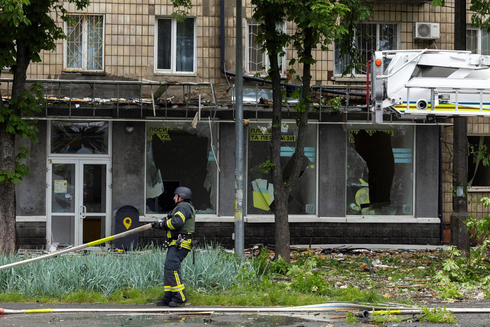 A firefighter works at the site of a Russian drone strike, amid Russia's attack on Ukraine, in Kyiv, Ukraine, May 7, 2025. REUTERS/Thomas Peter Photo: Thomas Peter/REUTERS