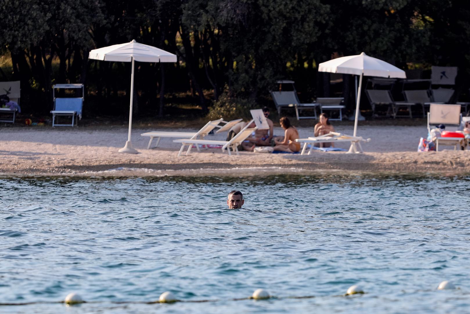 18.07.2024., Petrčane - Arijan Ademi odmara na plazi u Punta Skali Photo: Sime Zelic/PIXSELL