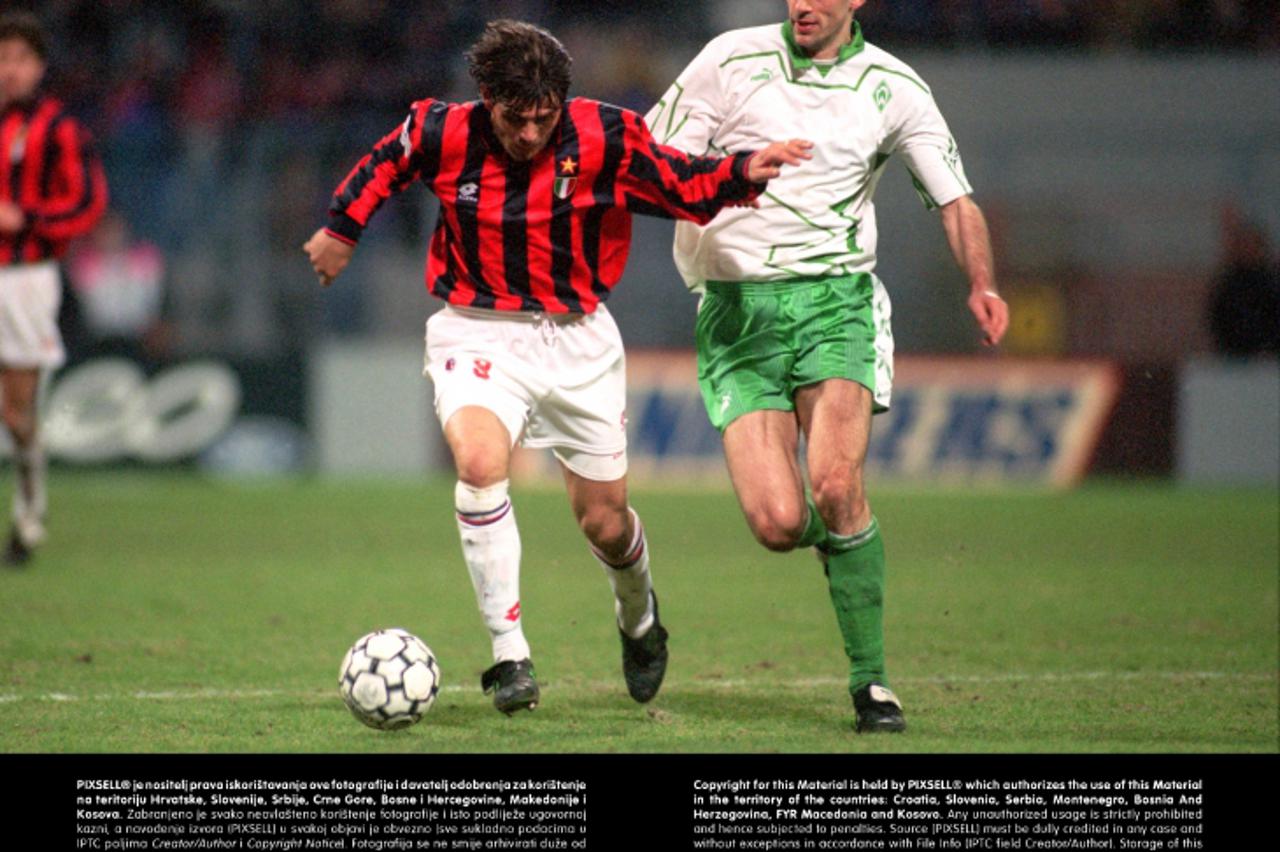 'AC Milan\'s Zvonimir Boban and Werder Breman\'s Frank Neubarth battle for the ballPhoto: Press Association/PIXSELL'