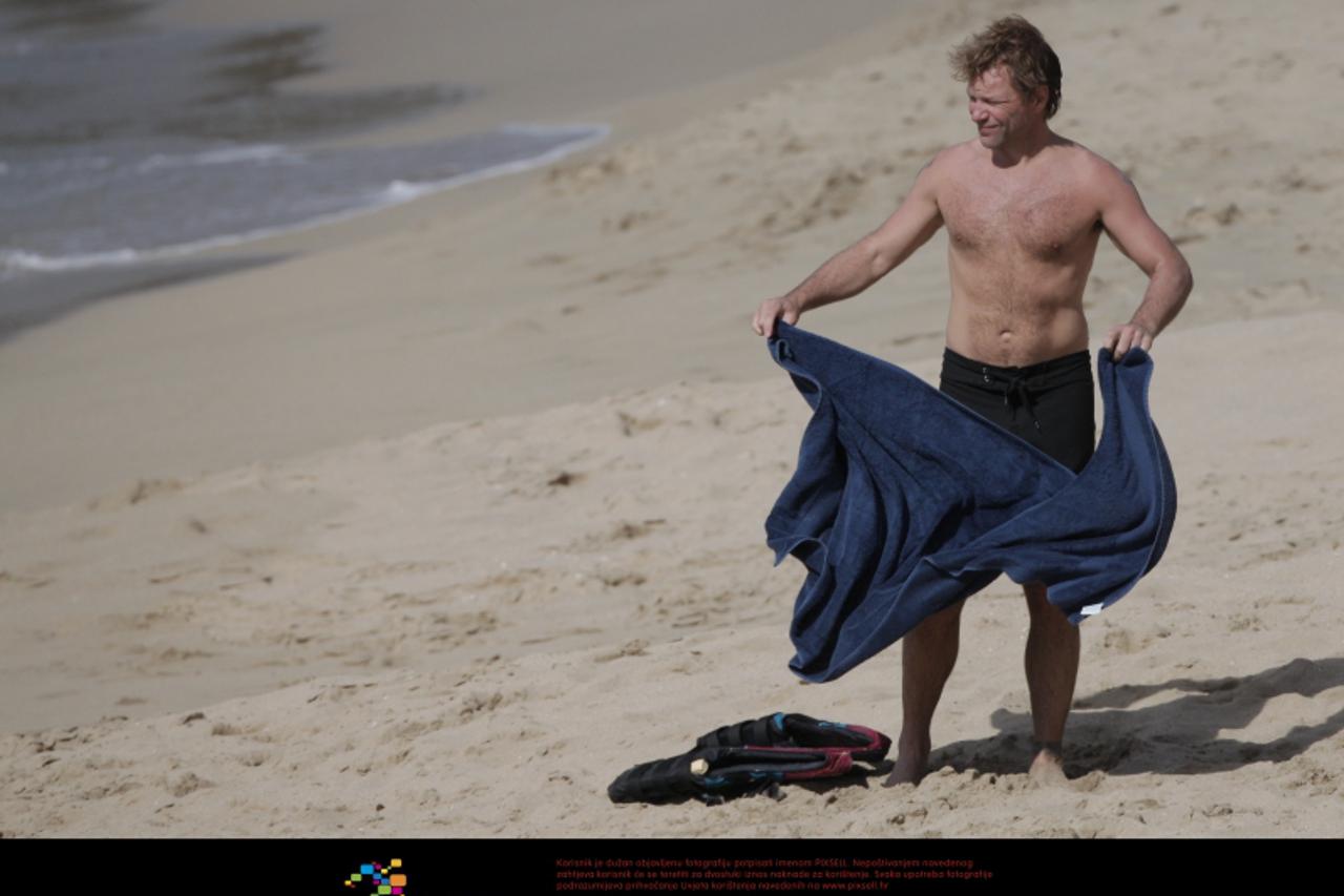 'Jon Bon Jovi with family in St Barthelemy on December 25, 2011. Photo by ABACAUSA.COM Photo: Press Association/Pixsell'