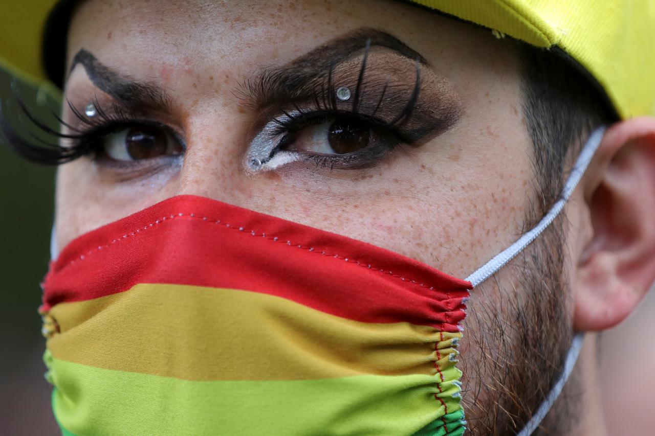People take part in the 25th gay pride parade in Amsterdam