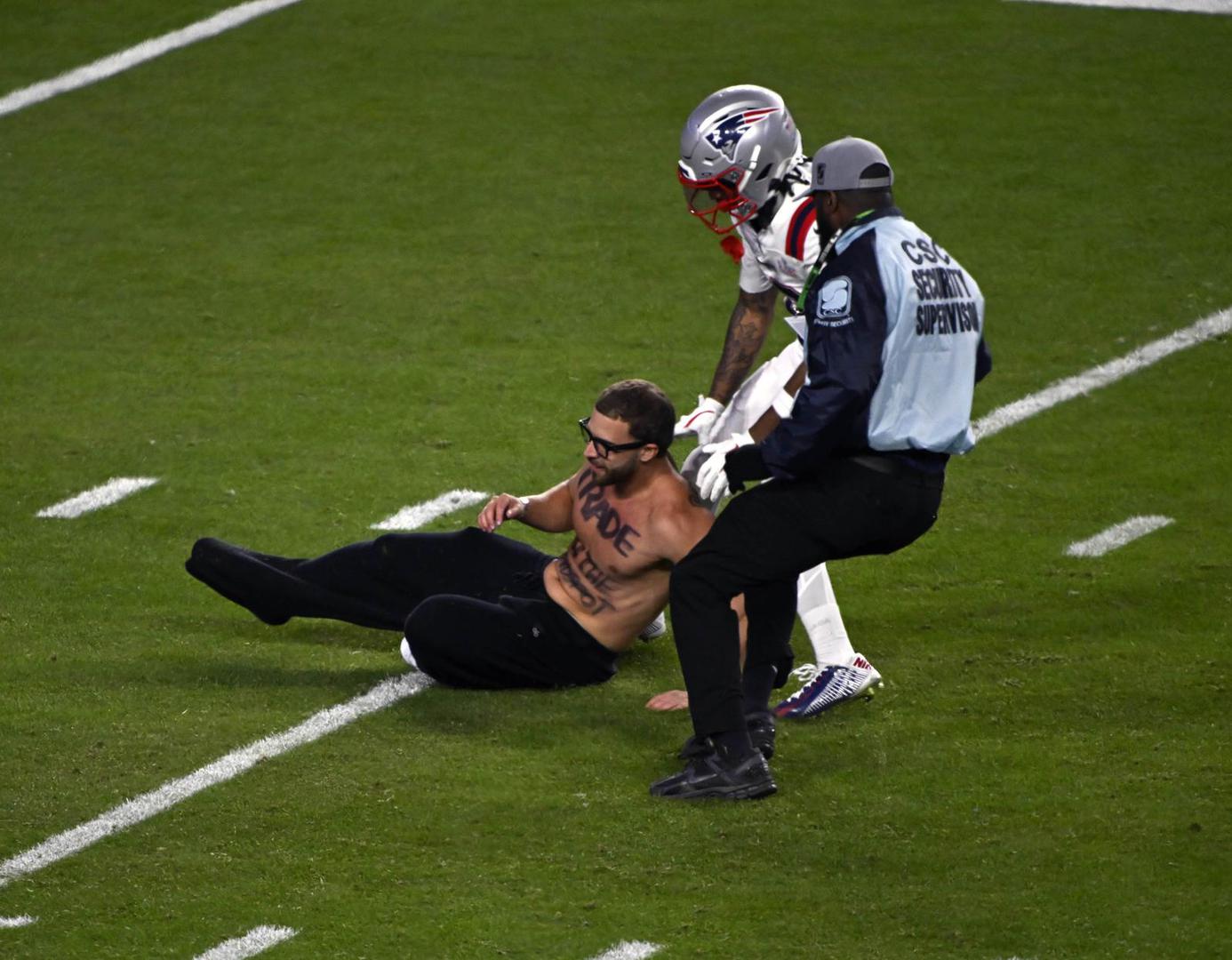 a fan runs onto the field during the NFL Super Bowl 60 LX football game between the New England Patriots and the Seattle Seahawks in Santa Clara, CA on Feb 8, 2026 Charles Baus/CSM.(Credit Image: Â Charles Baus/Cal Sport Media) Photo via Newscom Photo: Charles Baus/NEWSCOM