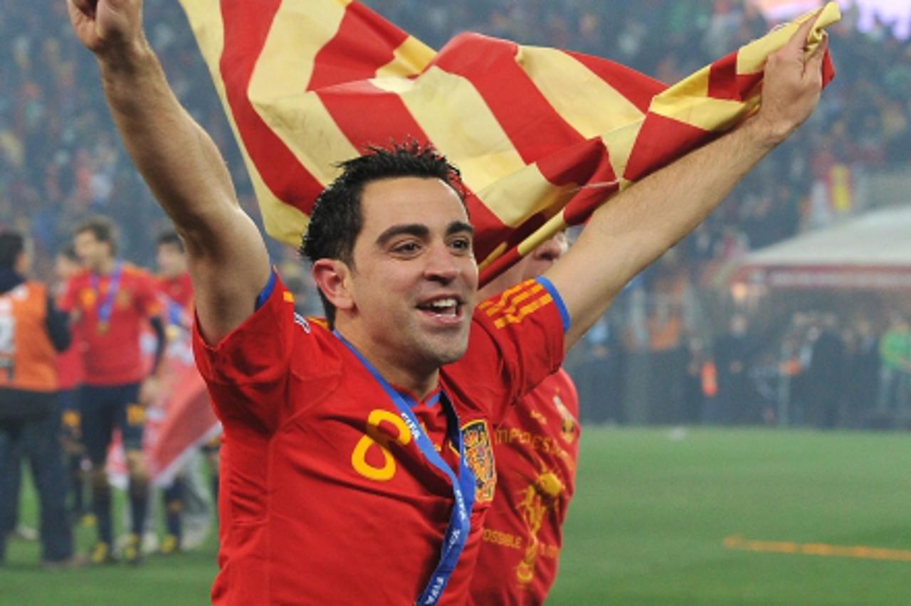 'Xavi of Spain celebrates  Photo: Press Association/Pixsell'
