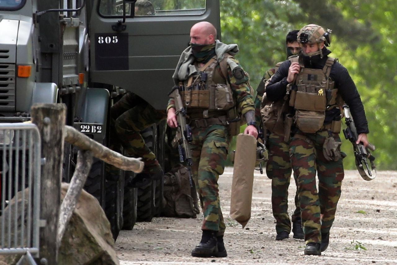 Manhunt for a Belgian soldier who threatened a virologist, in Maasmechelen