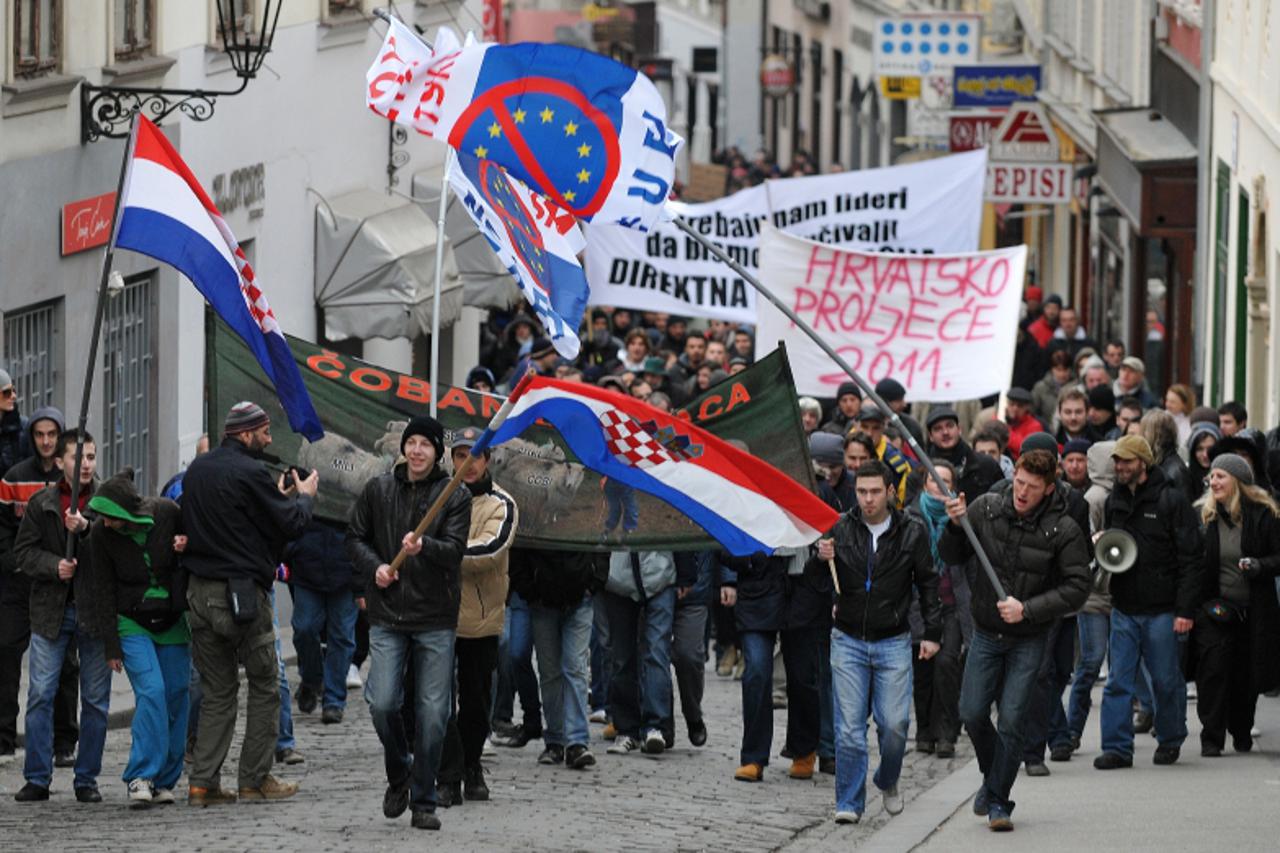 \'06.03.2011., Zagreb - Prosvjednici ciji je cilj rusenje Vlade Republike Hrvatske okupili su se oko 16 sati na Preradovicevom trgu te krenuli u povorci kroz grad. radiceva ulica. Photo: Anto Magzan/P