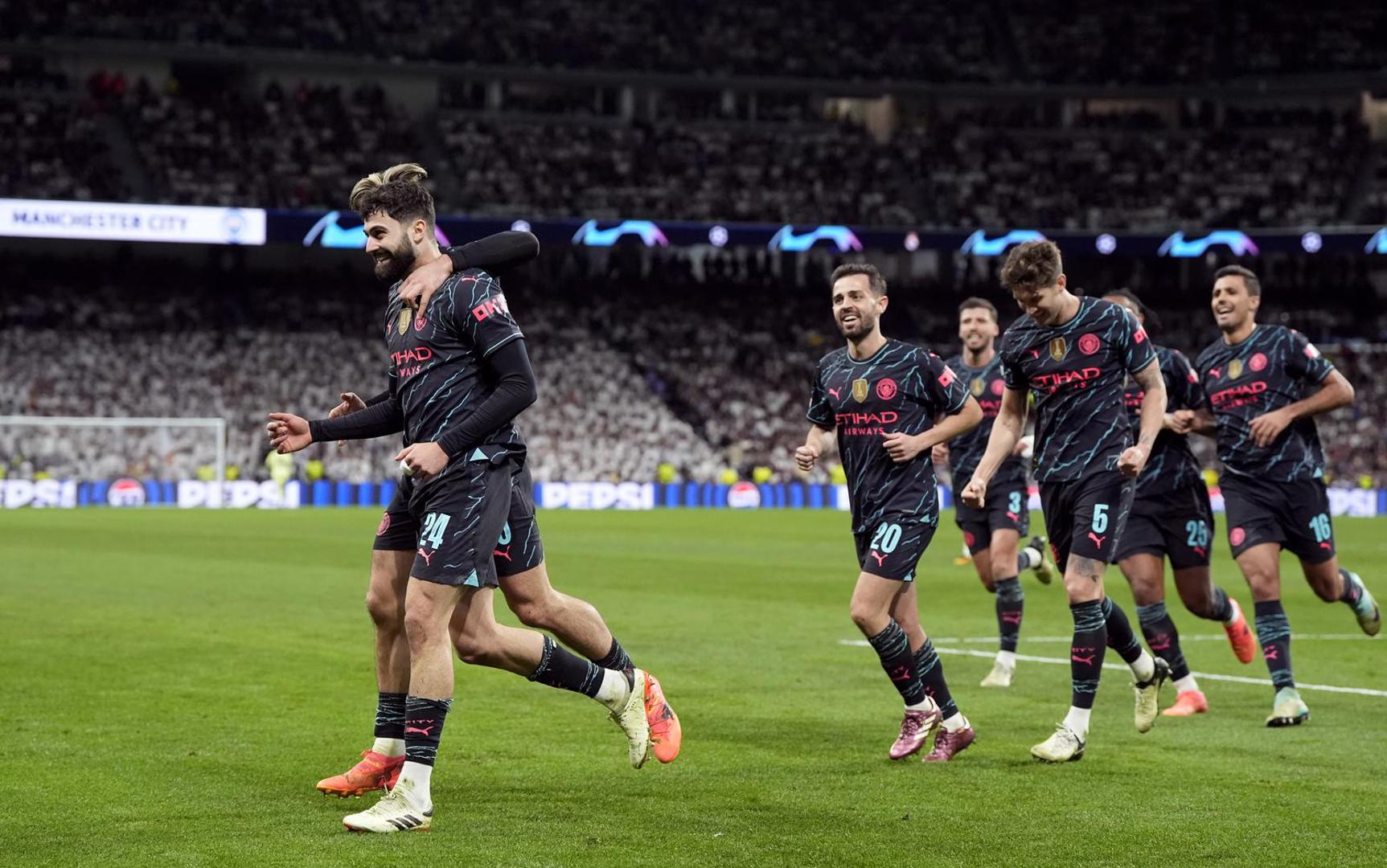 Manchester City's Josko Gvardiol celebrates scoring his sides third goal during the UEFA Champions League quarter-final, first leg match at the Santiago Bernabeu Stadium, Madrid. Picture date: Tuesday April 9, 2024. Photo: Nick Potts/PRESS ASSOCIATION
