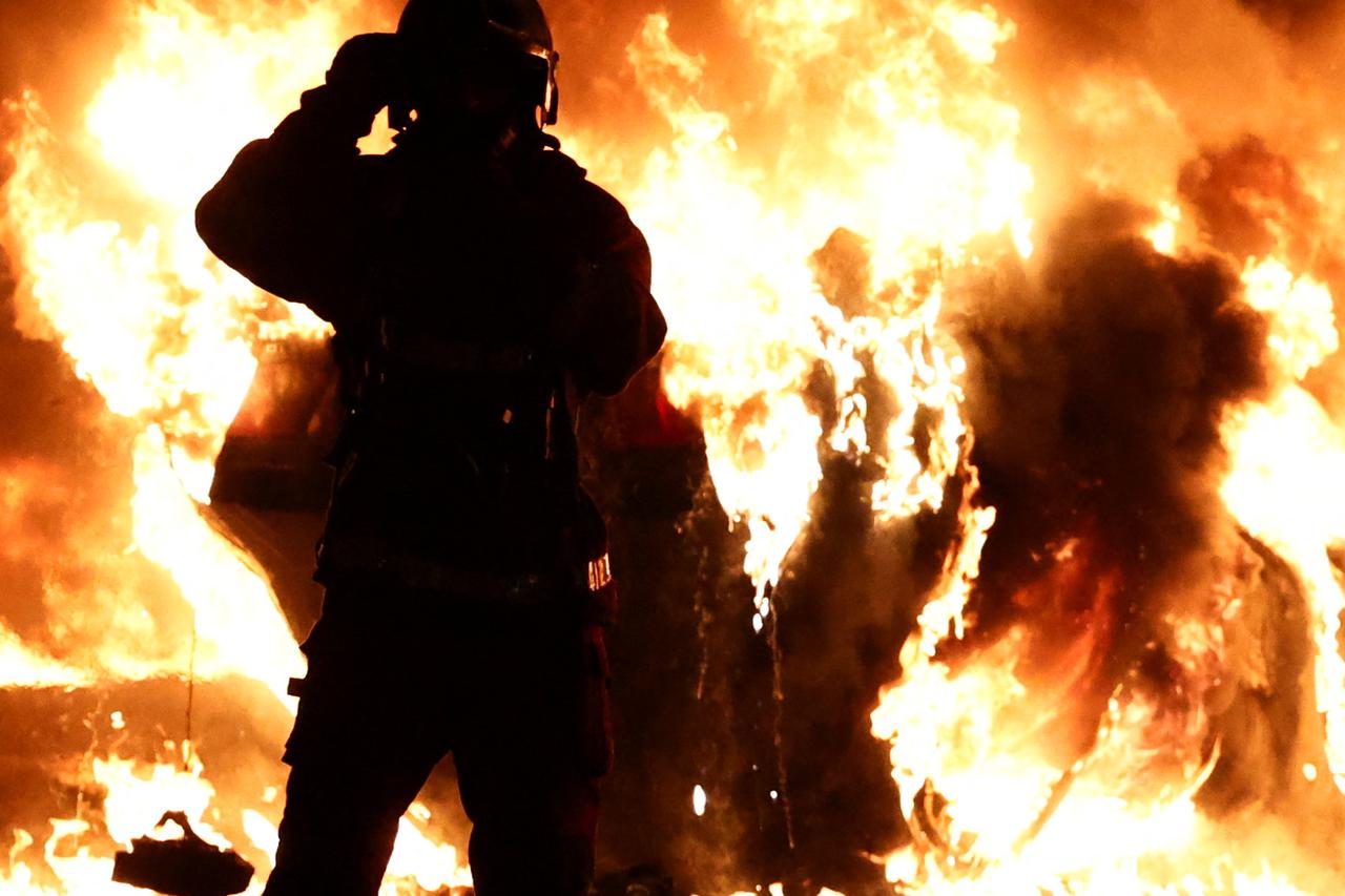 Riots after a teenager shot dead by police in Paris suburb