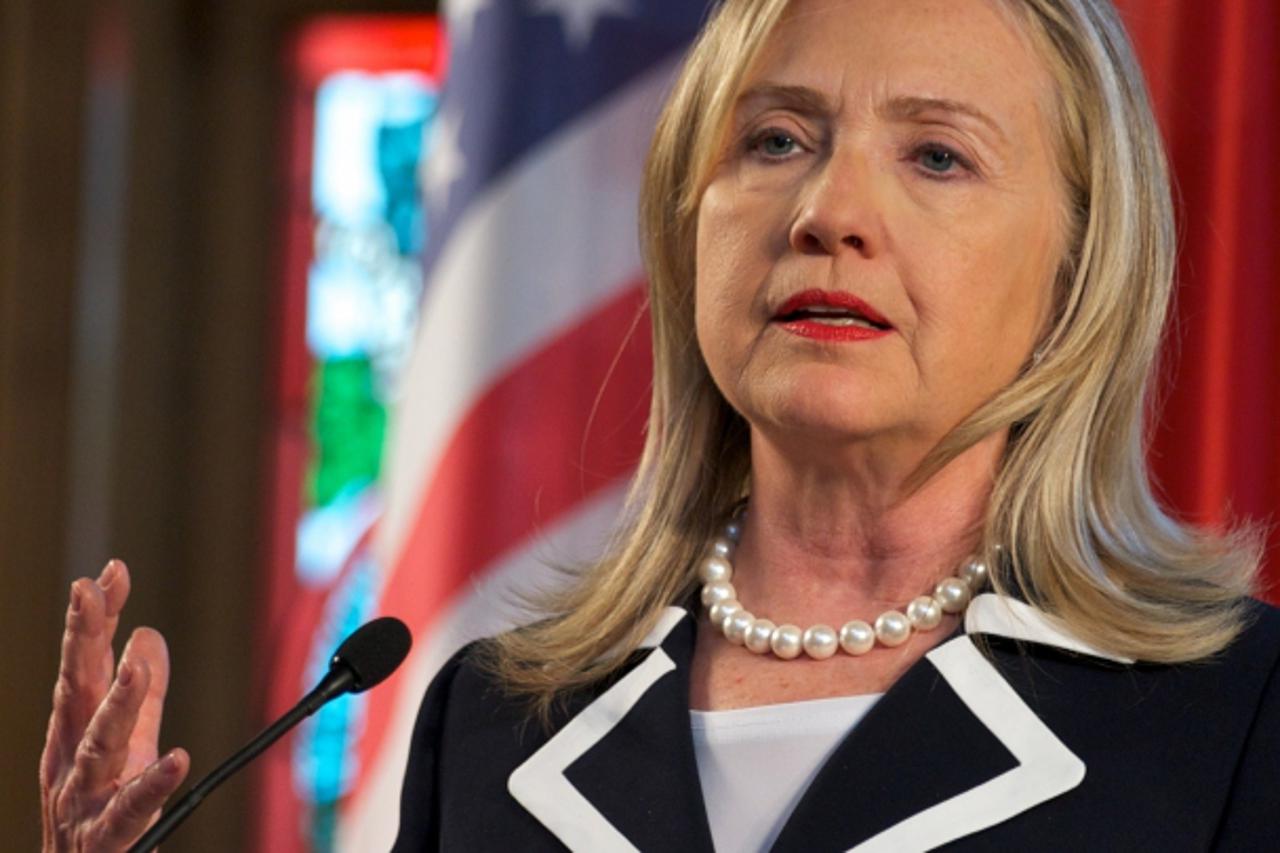 'US Secretary of State Hilary Clinton talks during a joint press conference with Latvia\'s Foreign minister following their meeting in Riga, Latvia, on June 28, 2012. Clinton touched down in Latvia on