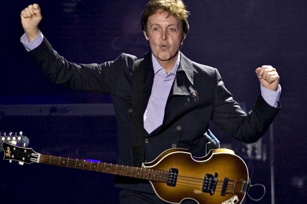 'Paul McCartney performs during a concert Sunday July 20, 2008 in Quebec City. (AP Photo/The Canadian Press, Jacques Boissinot)'