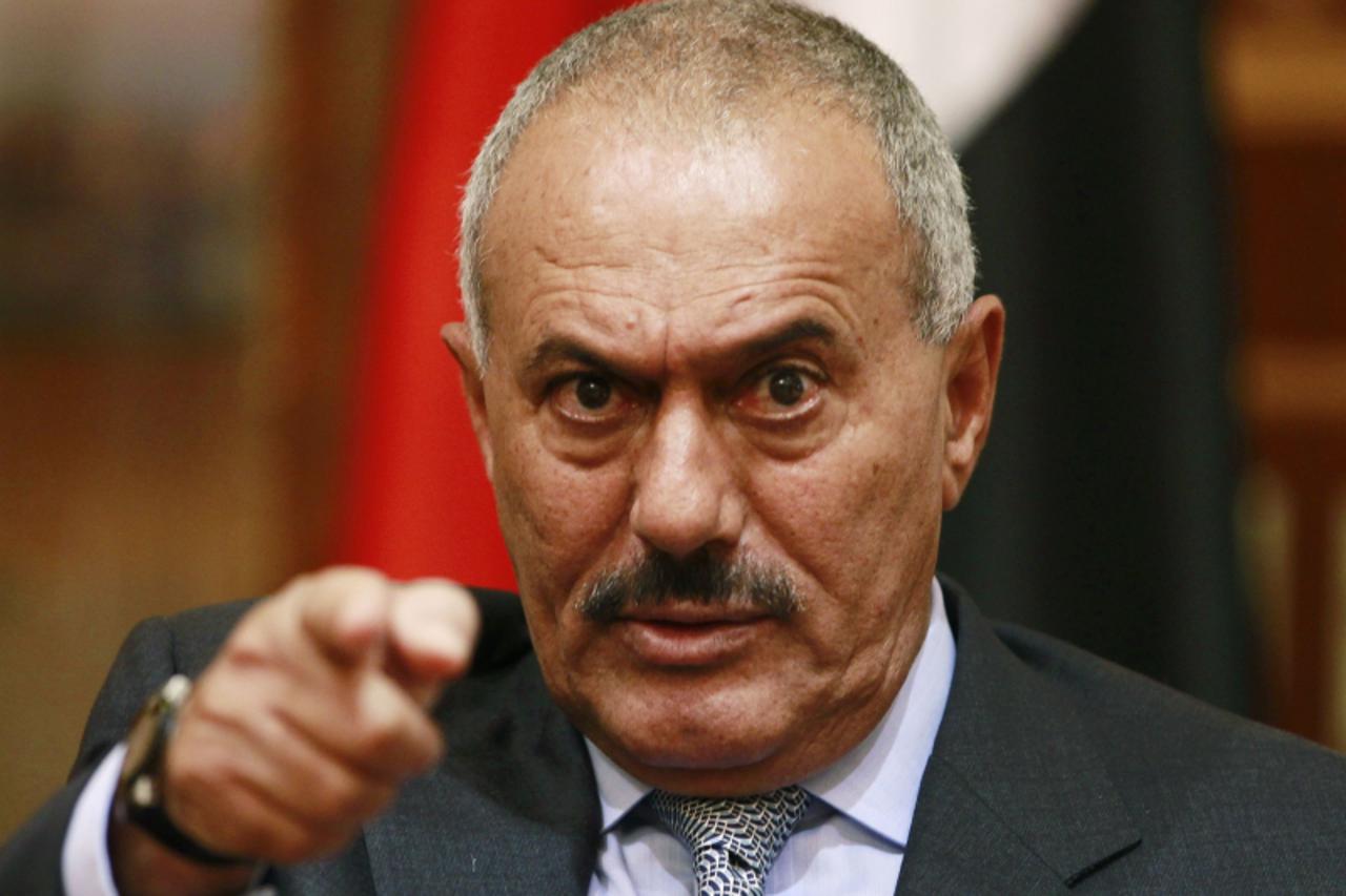 \'Yemen\'s President Ali Abdullah Saleh points during an interview with selected media, including Reuters, in Sanaa in this May 25, 2011 file photo. Saleh returned to Yemen on September 23, 2011, stat