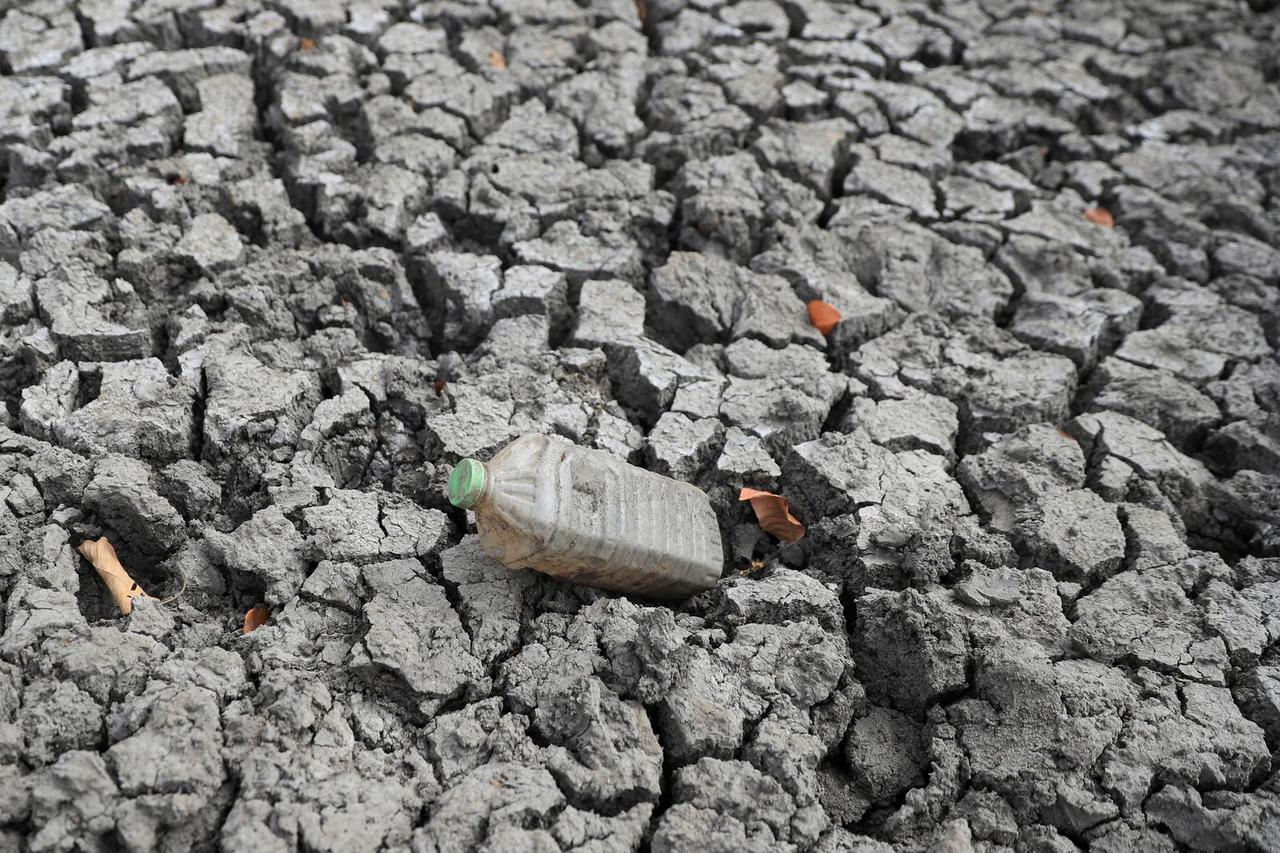 FILE PHOTO: A view of cracked ground at a dam, in Mudzi