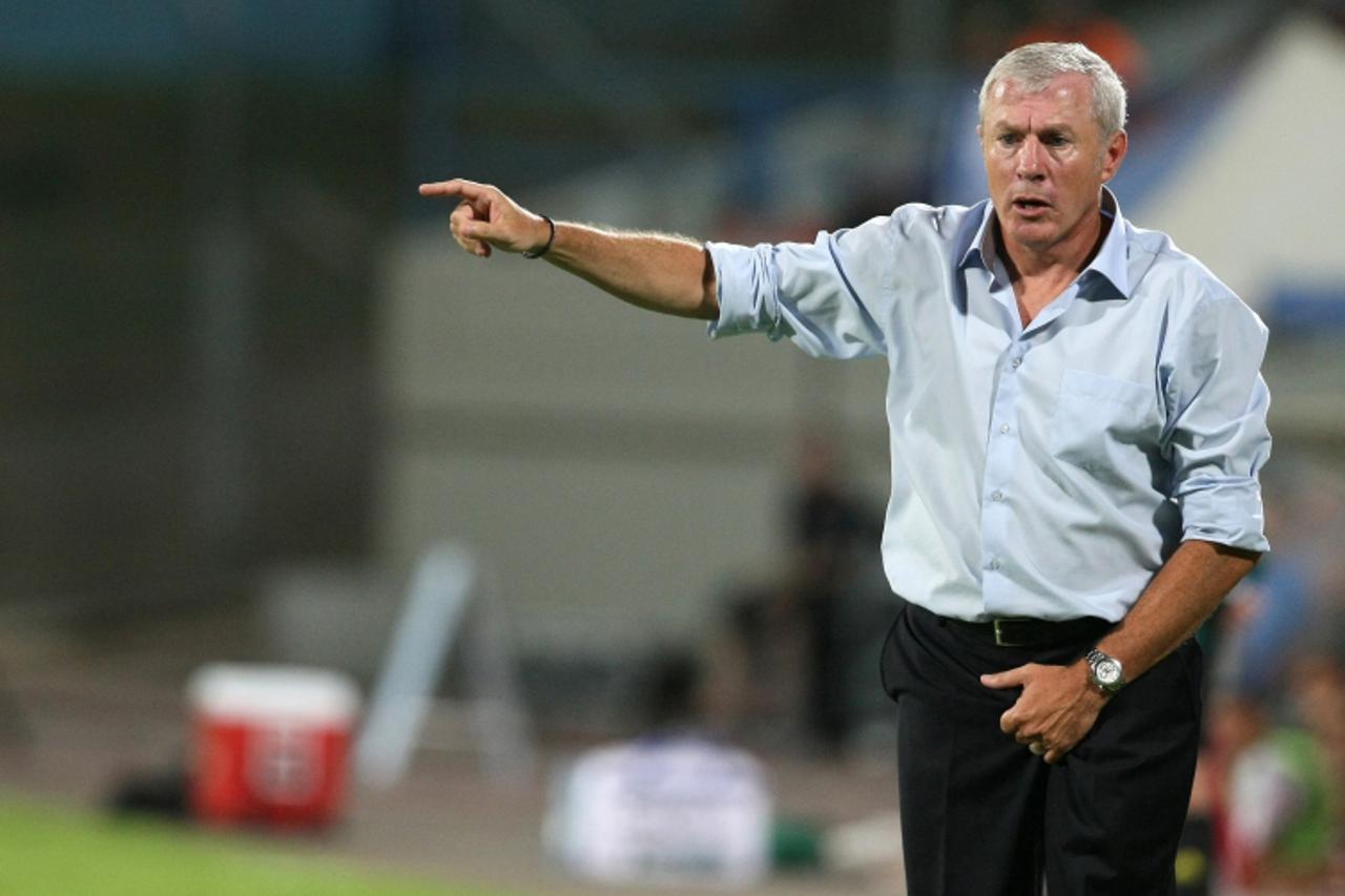 'Israel\'s coach Luis Fernandez gestures during their Euro 2012 qualifying group F football match against Malta at Ramat Gan stadium near Tel Aviv on September 2, 2010. AFP PHOTO/JACK GUEZ'