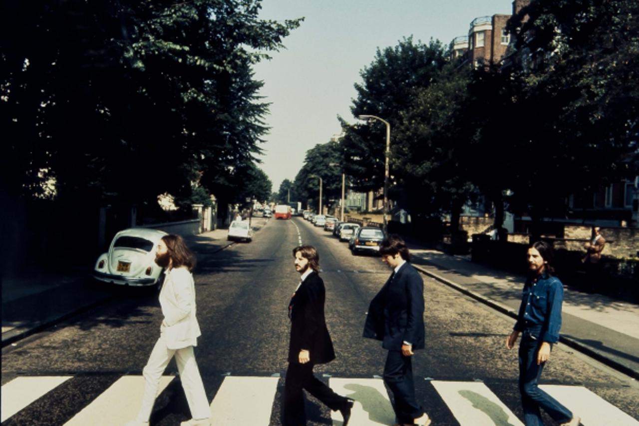 'The Beatles are seen walking across a zebra crossing in Abbey Road in London in this photograph taken in 1969 and received in London on May 18, 2012. The photograph, which will be auctioned by Blooms