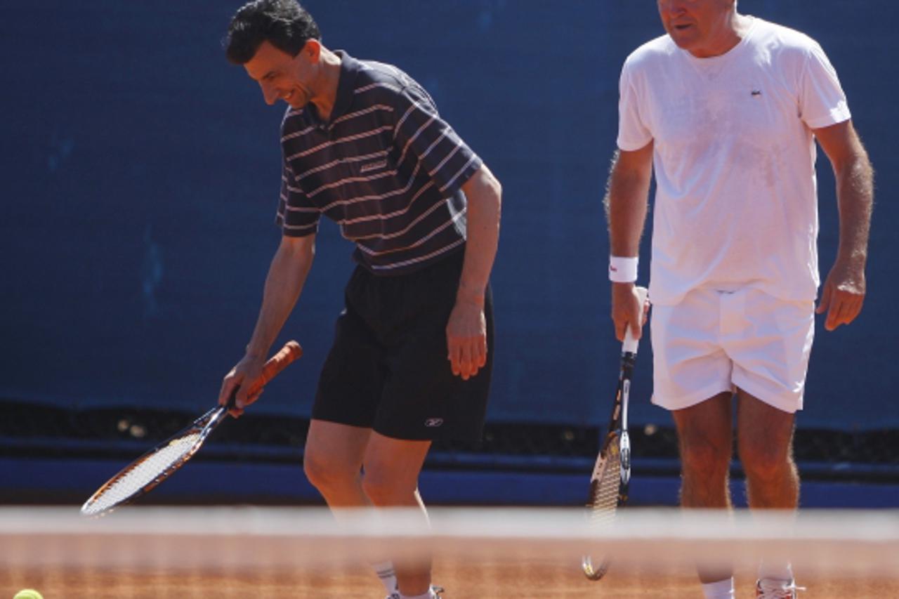 '31.07.2010., Umag - Teniski turnir Croatia Open, Medjunarodno prvenstvo Hrvatske u tenisu. Turnir poznatih, Don Andjelko Kacunko i Ante Vlahovic.  Photo: Slavko Midzor/PIXSELL'