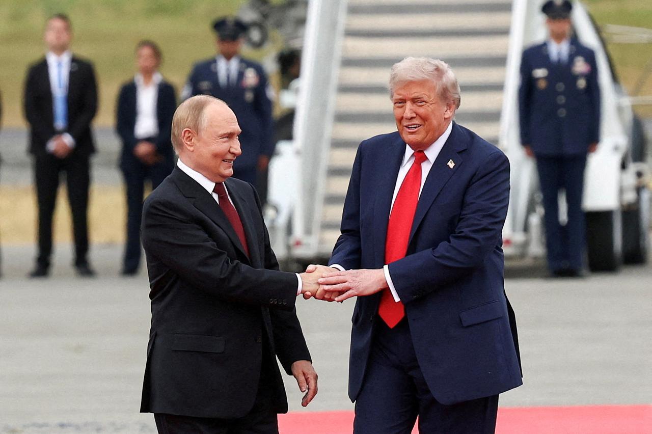 FILE PHOTO: U.S. President Trump meets with Russian President Putin in Alaska
